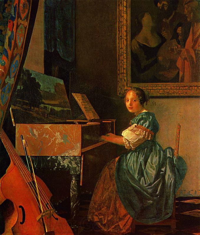 Johannes Vermeer A Lady Seated at a Virginal